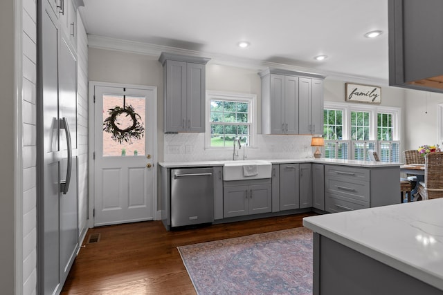9334 Royal Mountain Dr, Chattanooga, TN 37421 - kitchen featuring dishwasher, gray cabinets, crown molding, dark wood finished floors, and backsplash