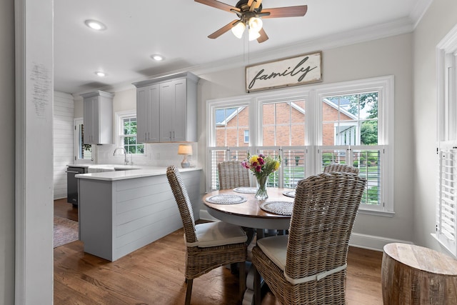 9334 Royal Mountain Dr, Chattanooga, TN 37421 - dining space with ceiling fan, wood finished floors, crown molding, and recessed lighting