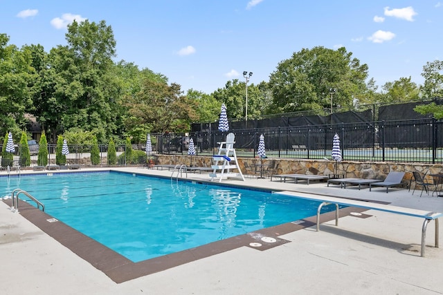 9334 Royal Mountain Dr, Chattanooga, TN 37421 - community pool with a patio area and view of wooded area