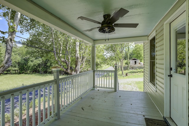 109 S Clear Springs Rd, Limestone, TN 37681 - wooden terrace with a ceiling fan and view of scattered trees