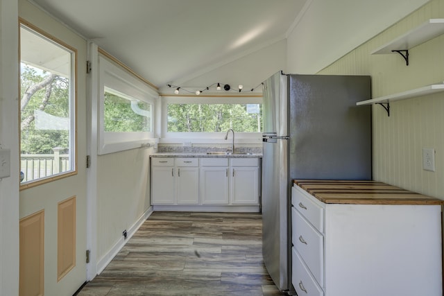 109 S Clear Springs Rd, Limestone, TN 37681 - kitchen featuring a sink, vaulted ceiling, open shelves, white cabinetry, and freestanding refrigerator