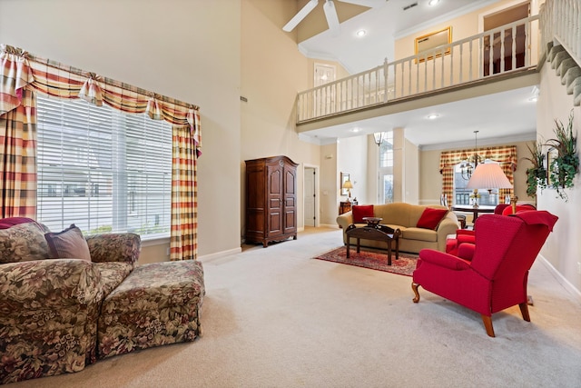 8207 Carriage Xing, Chattanooga, TN 37421 - living area featuring carpet floors, healthy amount of natural light, baseboards, a high ceiling, and ornamental molding