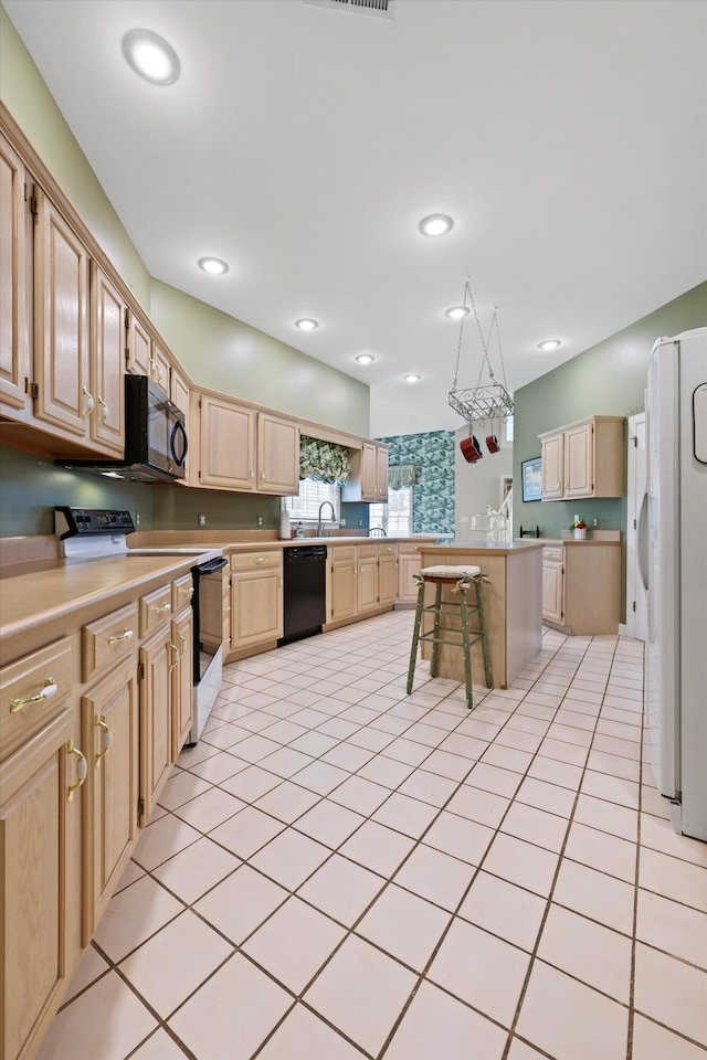 8207 Carriage Xing, Chattanooga, TN 37421 - kitchen featuring black appliances, light brown cabinetry, a sink, light countertops, and recessed lighting