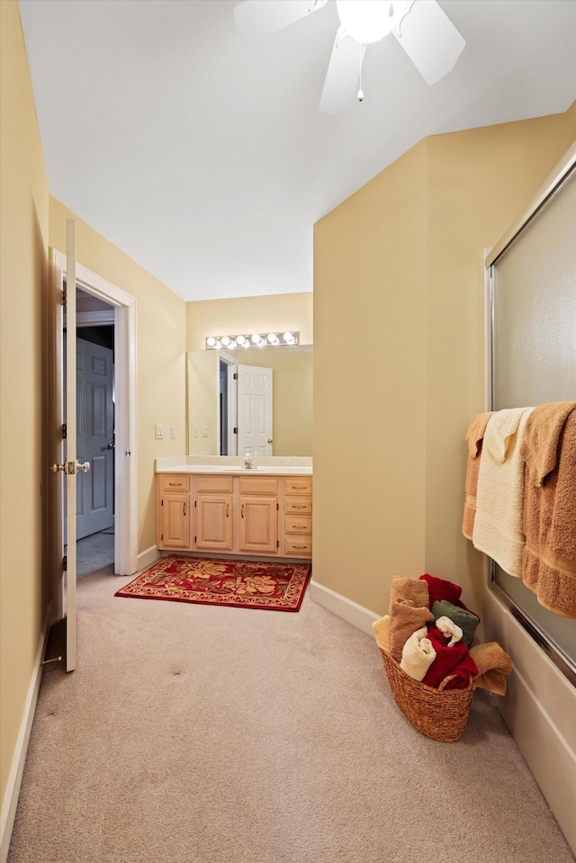 8207 Carriage Xing, Chattanooga, TN 37421 - bathroom featuring carpet, vanity, baseboards, and ceiling fan