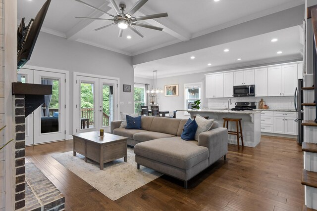 4867 Preserve Dr, Chattanooga, TN 37416 - living area with recessed lighting, beam ceiling, dark wood-type flooring, a chandelier, and ornamental molding