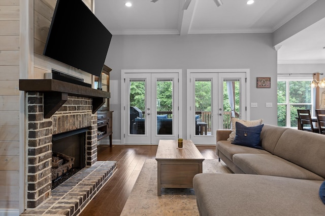 4867 Preserve Dr, Chattanooga, TN 37416 - living room featuring french doors, ornamental molding, recessed lighting, a brick fireplace, and wood-type flooring