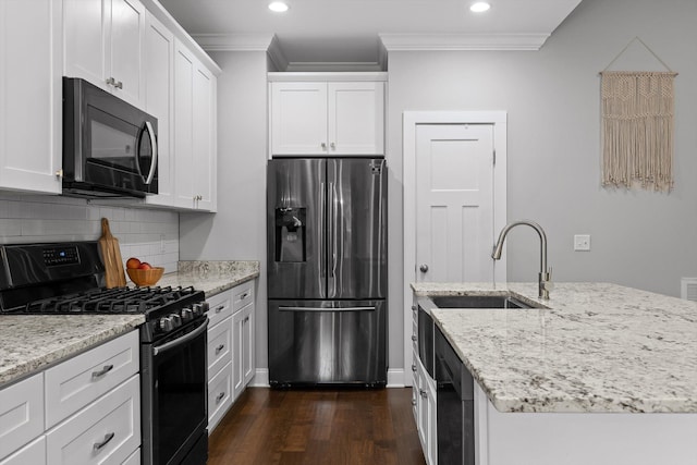 4867 Preserve Dr, Chattanooga, TN 37416 - kitchen with black appliances, ornamental molding, dark wood-style floors, tasteful backsplash, and white cabinetry