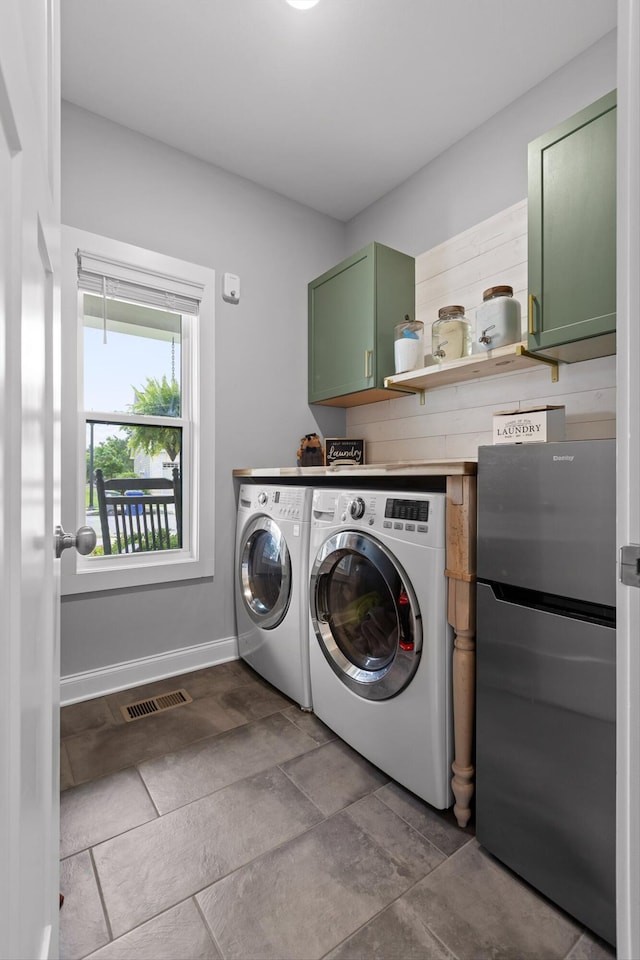 4867 Preserve Dr, Chattanooga, TN 37416 - laundry room featuring washer and clothes dryer, cabinet space, and baseboards