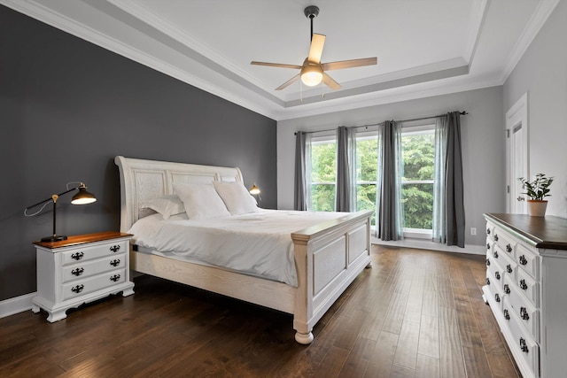 4867 Preserve Dr, Chattanooga, TN 37416 - bedroom with a raised ceiling, dark wood finished floors, ornamental molding, baseboards, and ceiling fan