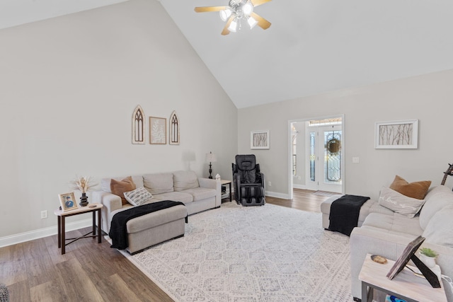 1549 Leighton Dr, Soddy Daisy, TN 37379 - living area with high vaulted ceiling, wood finished floors, ceiling fan, and baseboards