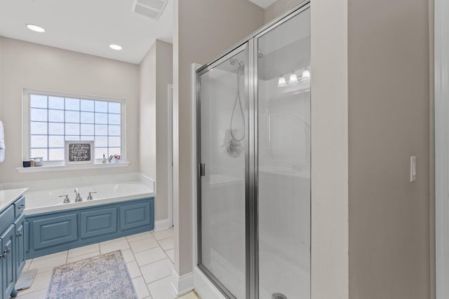 1549 Leighton Dr, Soddy Daisy, TN 37379 - full bath featuring a stall shower, vanity, a bath, and tile patterned flooring
