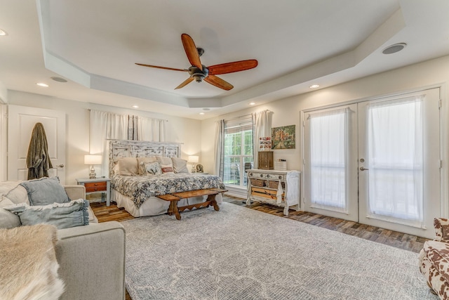 201 N Tibbs Rd, Dalton, GA 30720 - bedroom featuring a raised ceiling, wood finished floors, french doors, access to outside, and recessed lighting