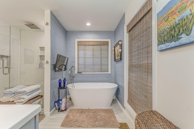 201 N Tibbs Rd, Dalton, GA 30720 - full bath featuring a shower stall, a freestanding tub, and recessed lighting
