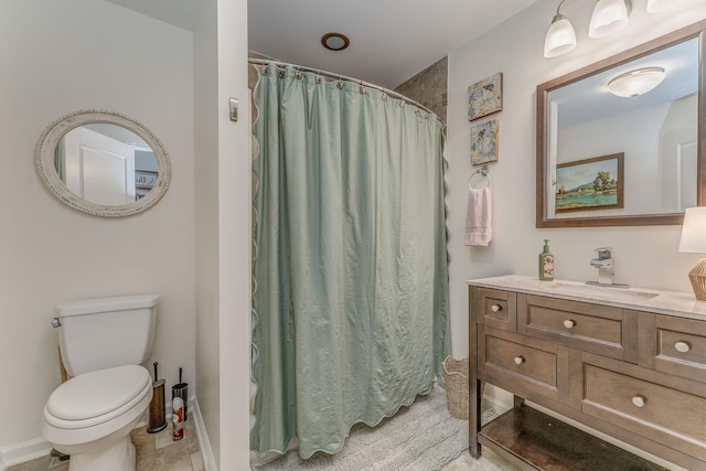201 N Tibbs Rd, Dalton, GA 30720 - bathroom with toilet, vanity, curtained shower, and baseboards