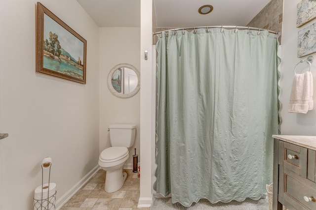 201 N Tibbs Rd, Dalton, GA 30720 - bathroom with toilet, vanity, baseboards, and a shower with curtain
