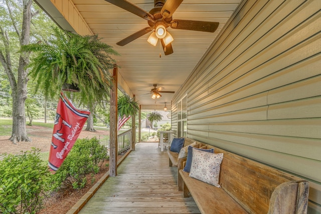 201 N Tibbs Rd, Dalton, GA 30720 - wooden porch with a ceiling fan