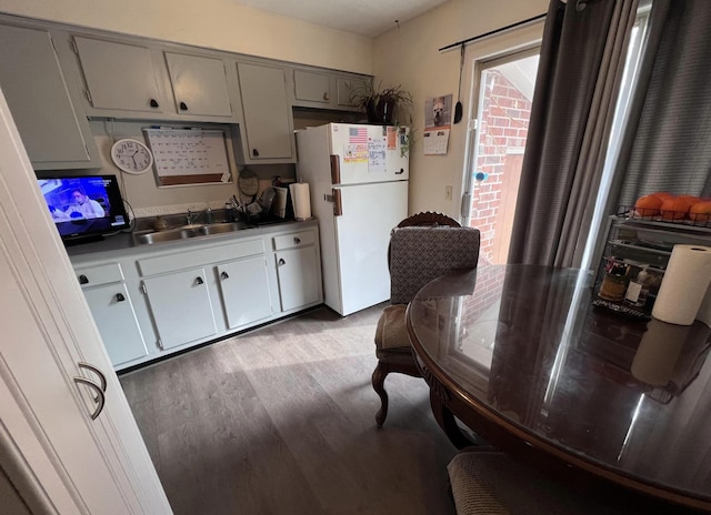 1202 Gadd Rd, Hixson, TN 37343 - kitchen featuring freestanding refrigerator, a sink, wood finished floors, dark countertops, and gray cabinetry