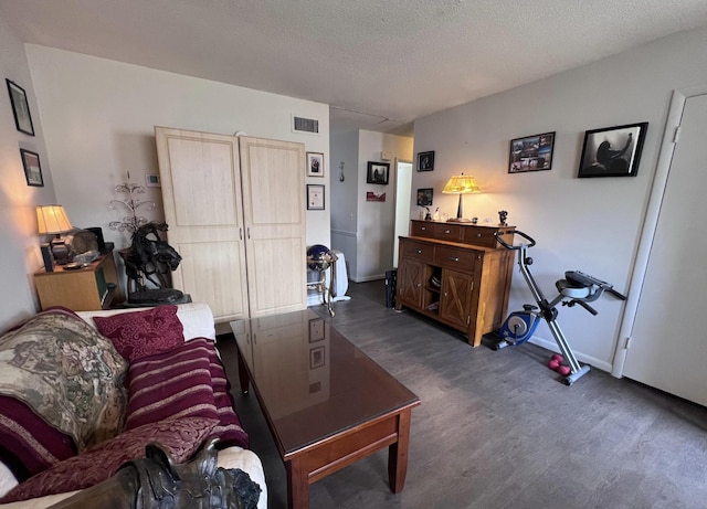 1202 Gadd Rd, Hixson, TN 37343 - living area with dark wood-style floors, baseboards, and a textured ceiling
