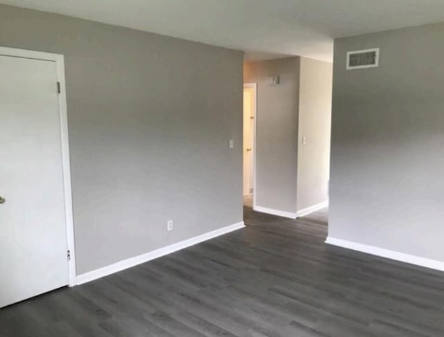 1202 Gadd Rd, Hixson, TN 37343 - spare room featuring baseboards and dark wood-style floors