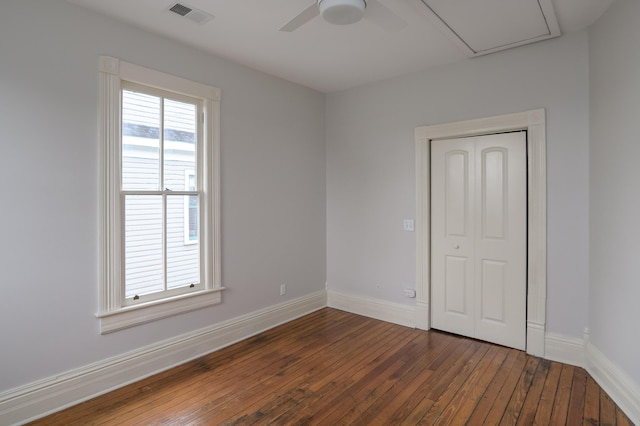 1501 Chamberlain Ave, Chattanooga, TN 37404 - unfurnished bedroom with dark wood-type flooring, baseboards, a closet, and ceiling fan