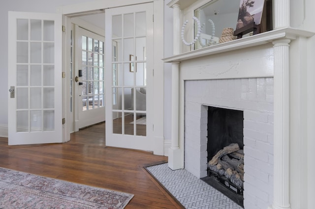 1501 Chamberlain Ave, Chattanooga, TN 37404 - detailed view of wood finished floors, a fireplace, and french doors