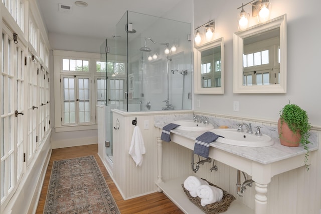 1501 Chamberlain Ave, Chattanooga, TN 37404 - bathroom featuring a shower stall, wood finished floors, and plenty of natural light
