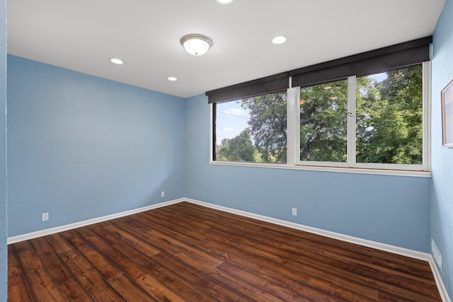 702 S Crest Rd, Chattanooga, TN 37404 - unfurnished room featuring plenty of natural light, baseboards, wood finished floors, and recessed lighting