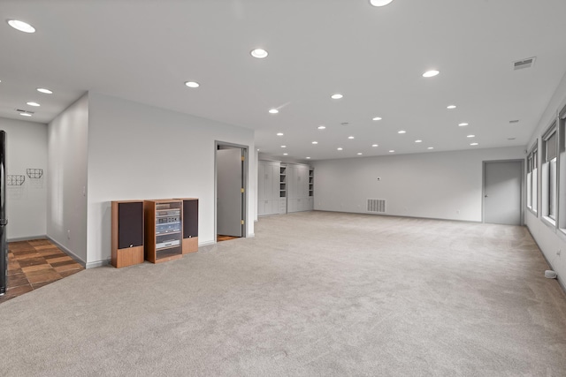 702 S Crest Rd, Chattanooga, TN 37404 - unfurnished living room featuring carpet and recessed lighting