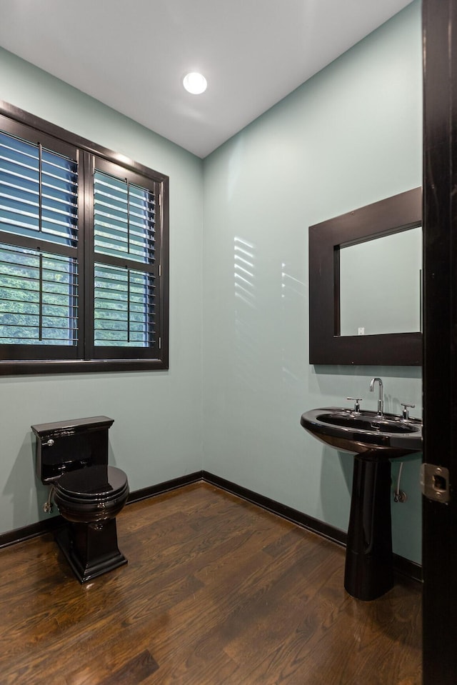 702 S Crest Rd, Chattanooga, TN 37404 - half bath featuring toilet, wood finished floors, and baseboards