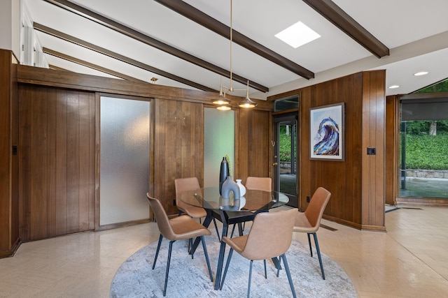 702 S Crest Rd, Chattanooga, TN 37404 - dining space featuring wood walls, healthy amount of natural light, and baseboards