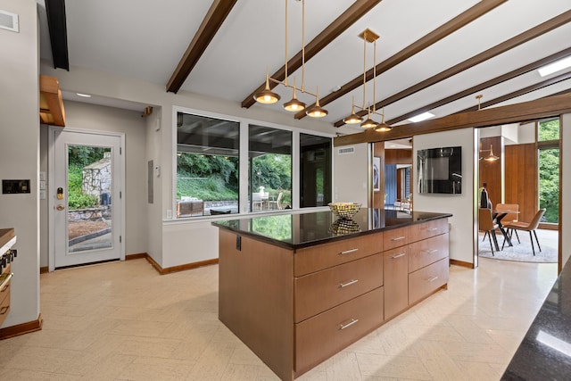 702 S Crest Rd, Chattanooga, TN 37404 - kitchen with baseboards, a kitchen island, modern cabinets, and plenty of natural light