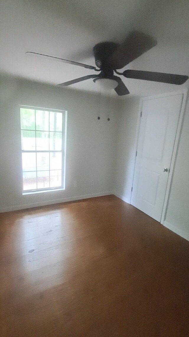 665 Scott Rd, Signal Mountain, TN 37377 - empty room featuring ceiling fan, wood finished floors, and baseboards