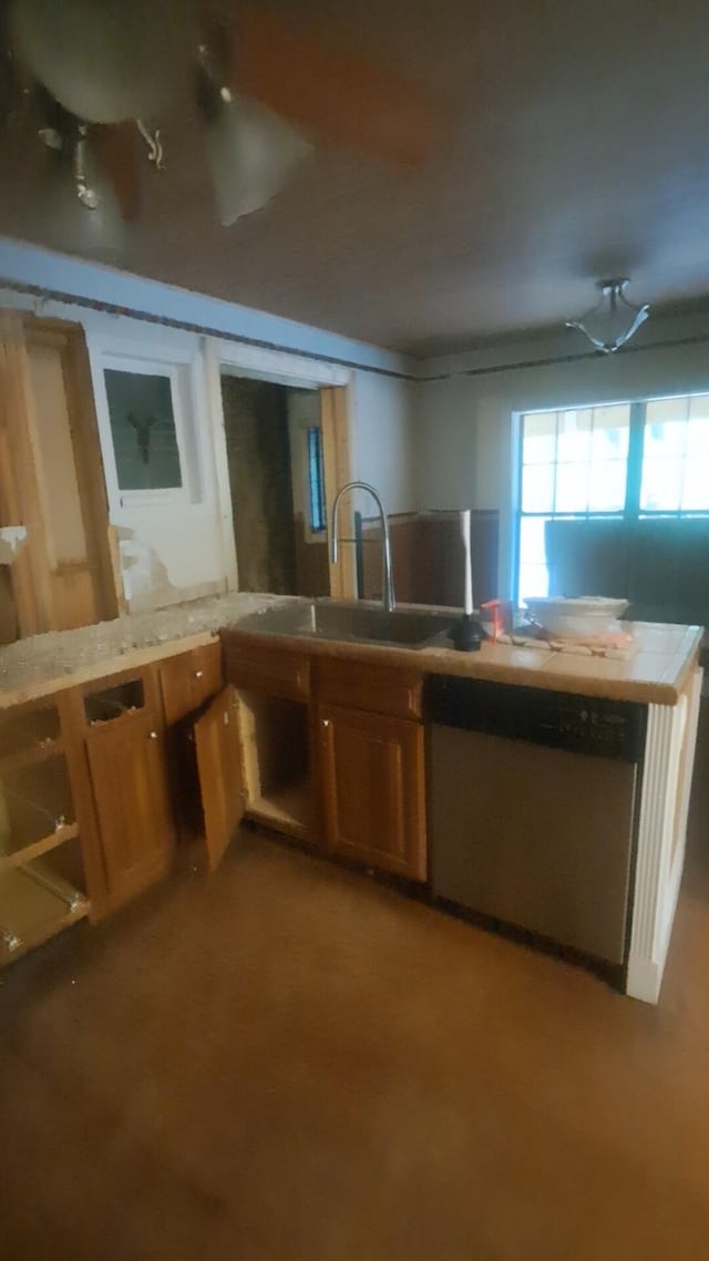 665 Scott Rd, Signal Mountain, TN 37377 - kitchen featuring a sink, stainless steel dishwasher, and brown cabinets