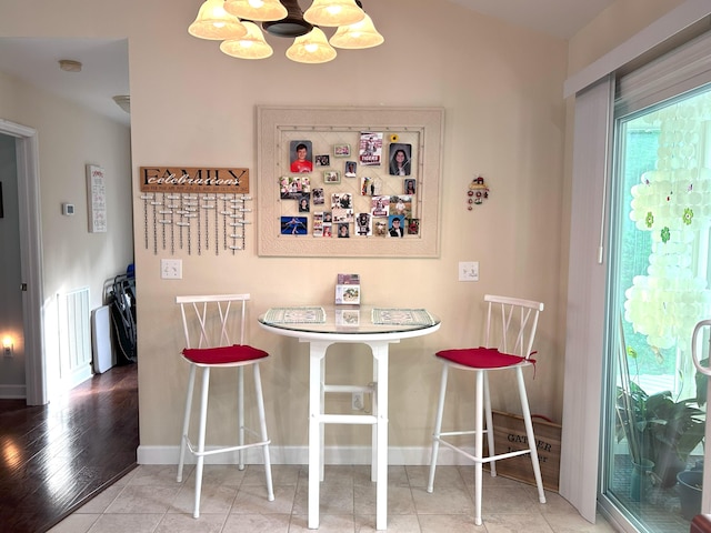 308 Bennie Camp Rd, Dunlap, TN 37327 - dining room with baseboards and a chandelier