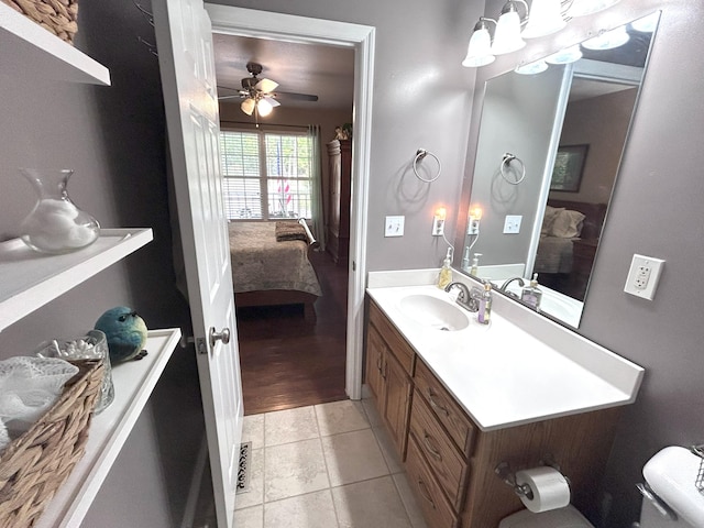 308 Bennie Camp Rd, Dunlap, TN 37327 - ensuite bathroom with a ceiling fan, vanity, toilet, and tile patterned flooring