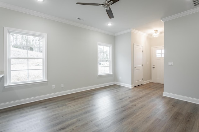 356 NE Bellingham Dr Unit 3D, Cleveland, TN 37312 - unfurnished room with a ceiling fan, crown molding, wood finished floors, baseboards, and healthy amount of natural light