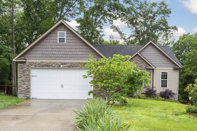 1804 Staghorn Dr, Soddy Daisy, TN 37379 - view of front of home with stone siding, concrete driveway, an attached garage, and a front yard
