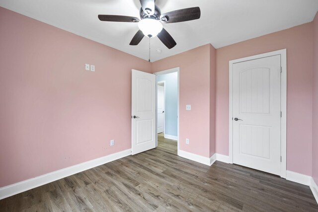 1804 Staghorn Dr, Soddy Daisy, TN 37379 - unfurnished bedroom with baseboards, wood finished floors, and ceiling fan