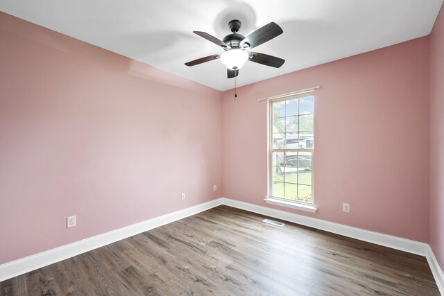 1804 Staghorn Dr, Soddy Daisy, TN 37379 - unfurnished room with baseboards, wood finished floors, and ceiling fan