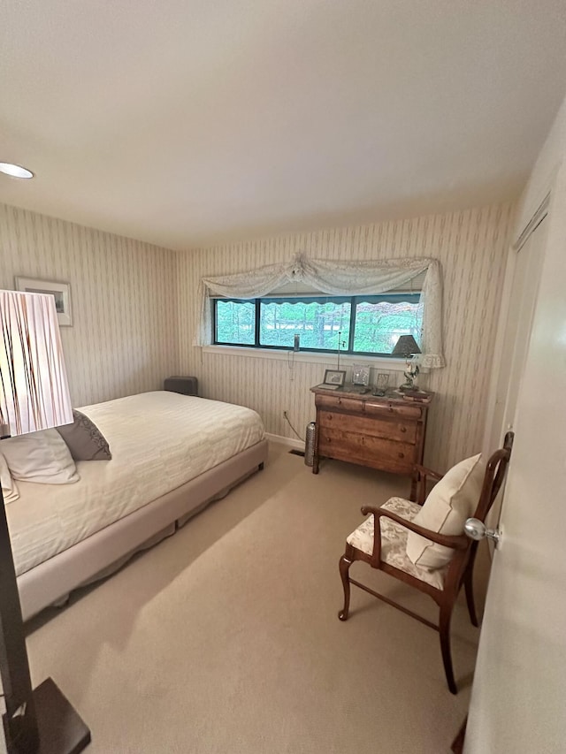 413 Fern Trl, Signal Mountain, TN 37377 - bedroom with wallpapered walls, multiple windows, and carpet flooring