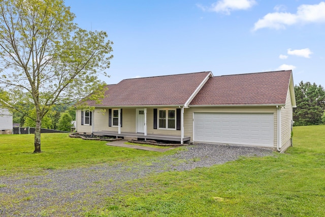 2959 Dogwood Valley Rd, Tunnel Hill, GA 30755 - view of front of home with an attached garage, a front yard, a porch, gravel driveway, and a shingled roof