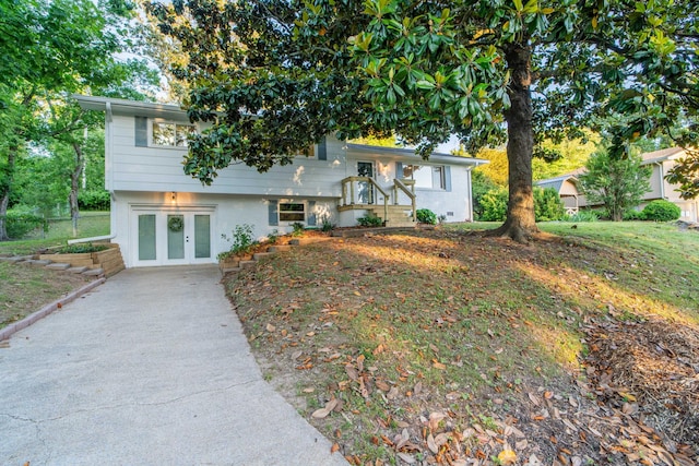 1306 Phyllis Ln, Chattanooga, TN 37421 - split level home featuring french doors and concrete driveway
