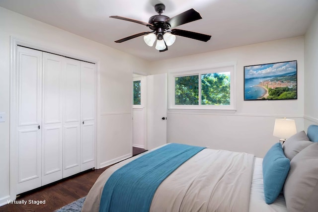 1306 Phyllis Ln, Chattanooga, TN 37421 - bedroom with dark wood-style flooring, a closet, and a ceiling fan