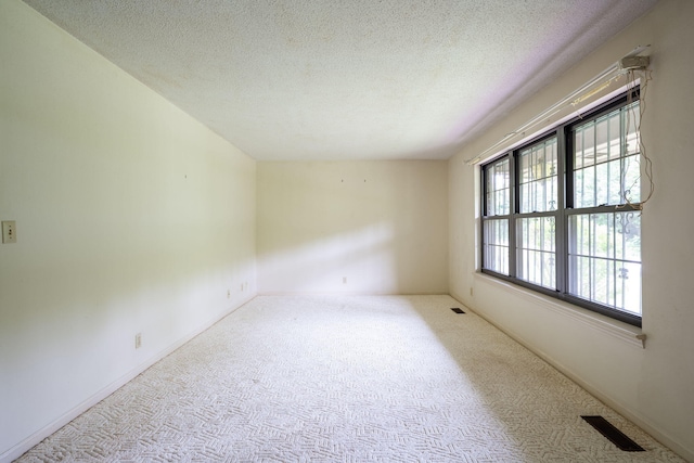 6515 Grubb Rd, Hixson, TN 37343 - carpeted empty room with a textured ceiling and baseboards