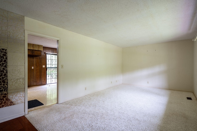 6515 Grubb Rd, Hixson, TN 37343 - carpeted spare room featuring a textured ceiling