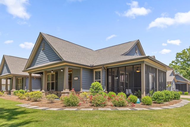 214 Camden Way Unit 38, Dalton, GA 30721 - back of house featuring a lawn, roof with shingles, a sunroom, and a porch