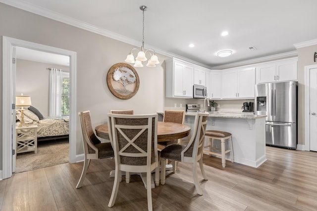 214 Camden Way Unit 38, Dalton, GA 30721 - dining room with light wood finished floors, crown molding, a chandelier, baseboards, and recessed lighting