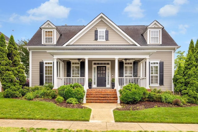 8650 Homecoming Dr, Chattanooga, TN 37421 - view of front of property featuring a porch, a shingled roof, and a front yard