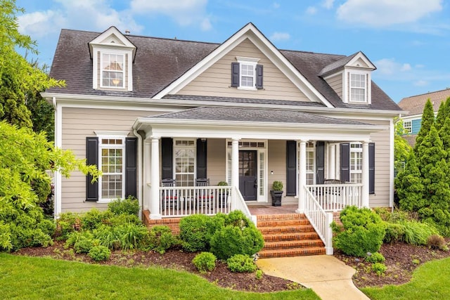 8650 Homecoming Dr, Chattanooga, TN 37421 - view of front of home featuring covered porch and a shingled roof