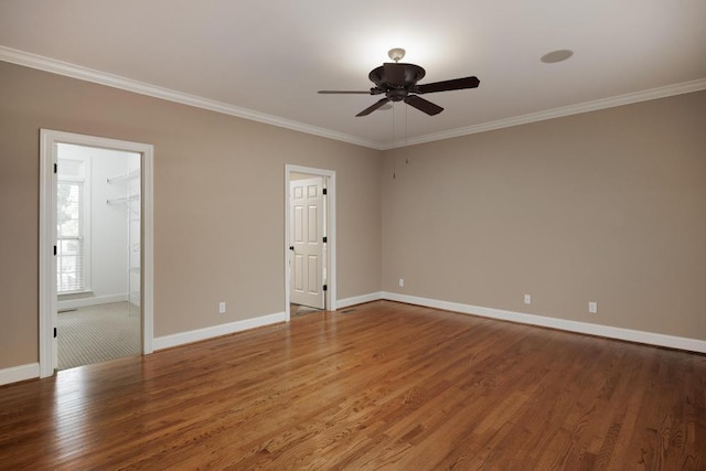 8650 Homecoming Dr, Chattanooga, TN 37421 - unfurnished bedroom featuring ornamental molding, baseboards, wood finished floors, and a ceiling fan